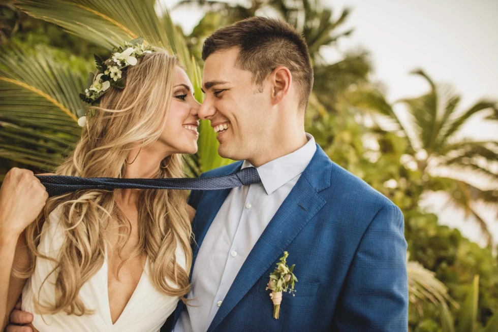 Groom Poses to Complement the Bride in Zihuatanejo